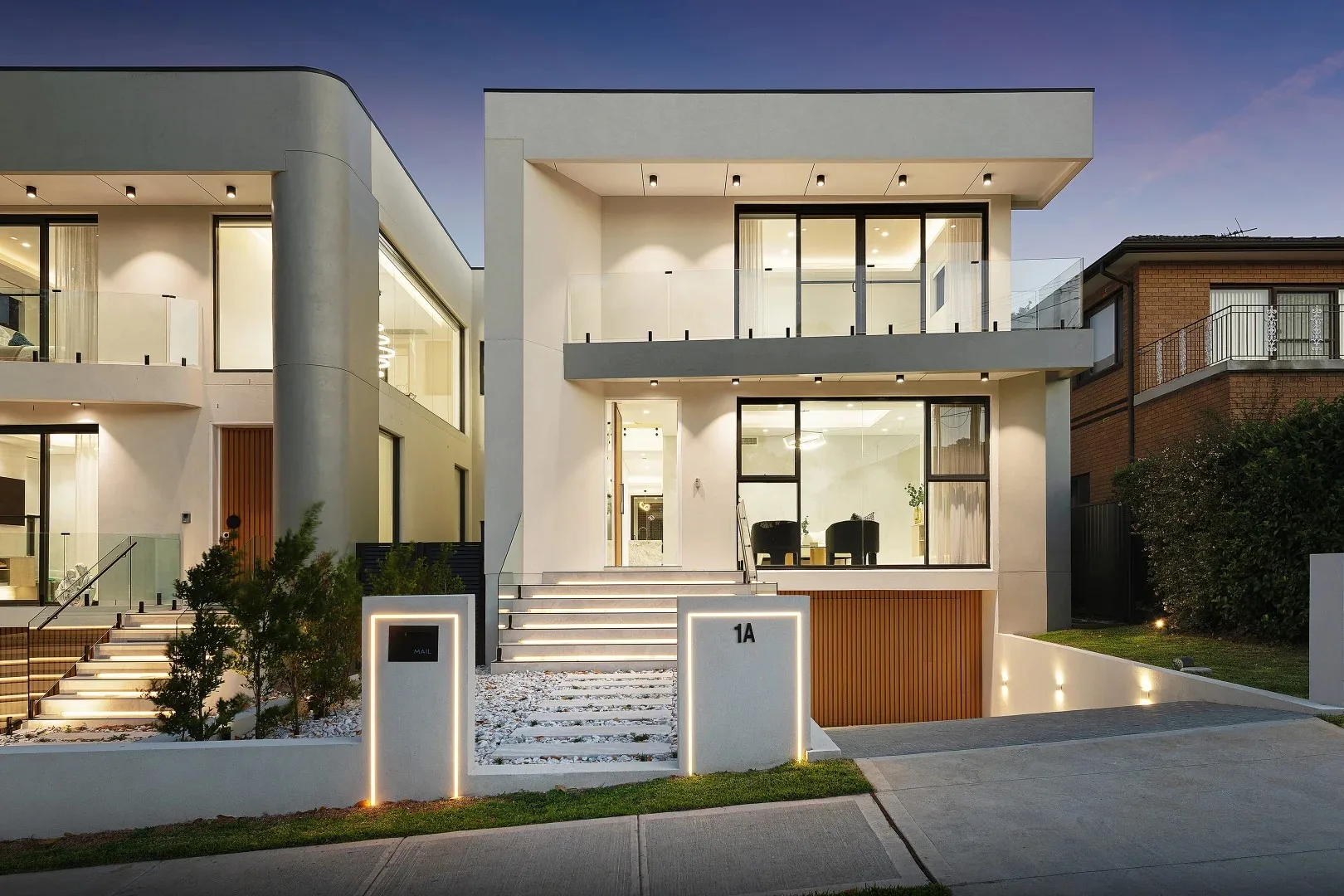 Aluminium glazing running across the upper level of a residence facade - AGM Windows & Doors, Sydney